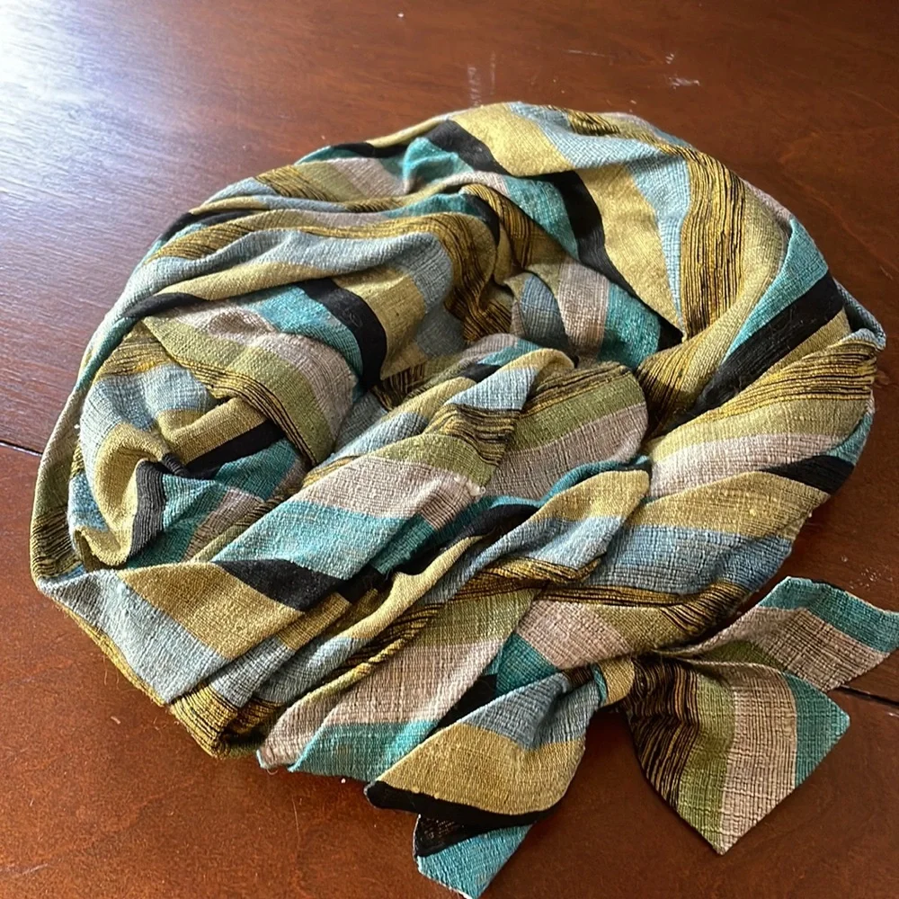 Vintage pin back hat Lynette Riviere